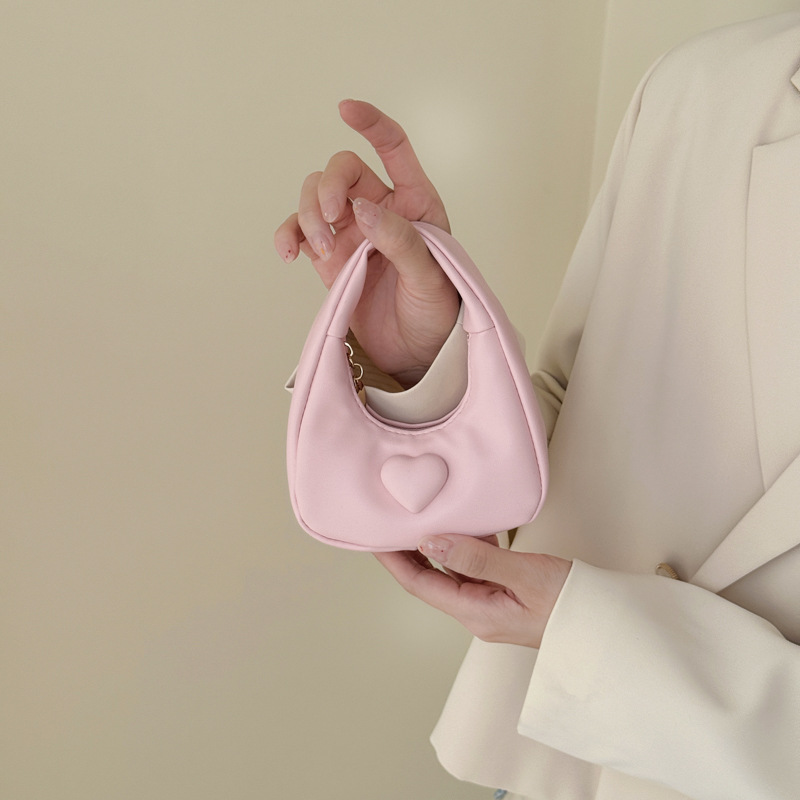 Bolso de amor de la princesa de aire exterior compacto mini bolso de cambio de moda de color sólido 2026 bolso de comercio exterior transfronterizo para niños