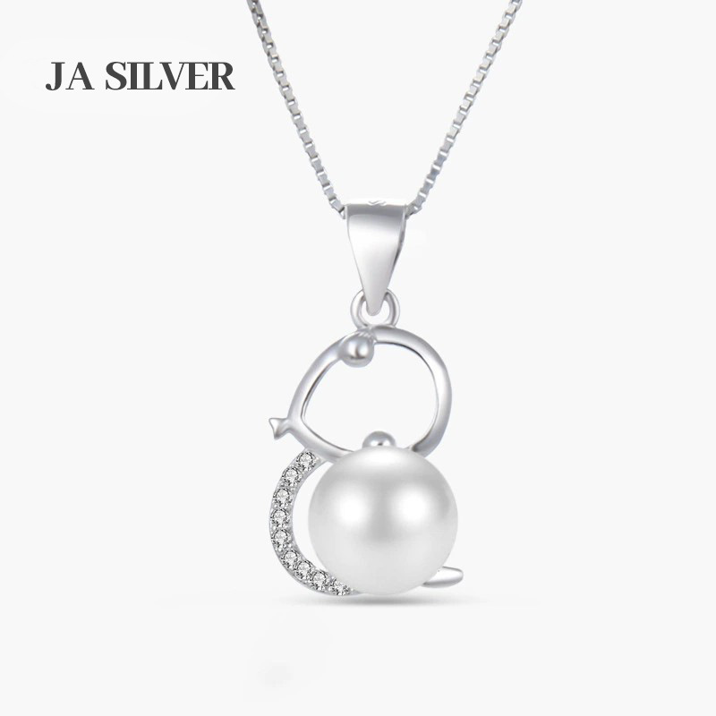 S925 plata esterlina serpiente perla colgante mujer simple ligero lujoso hueco sensación de diseño colgante de plata zodiacal al por mayor