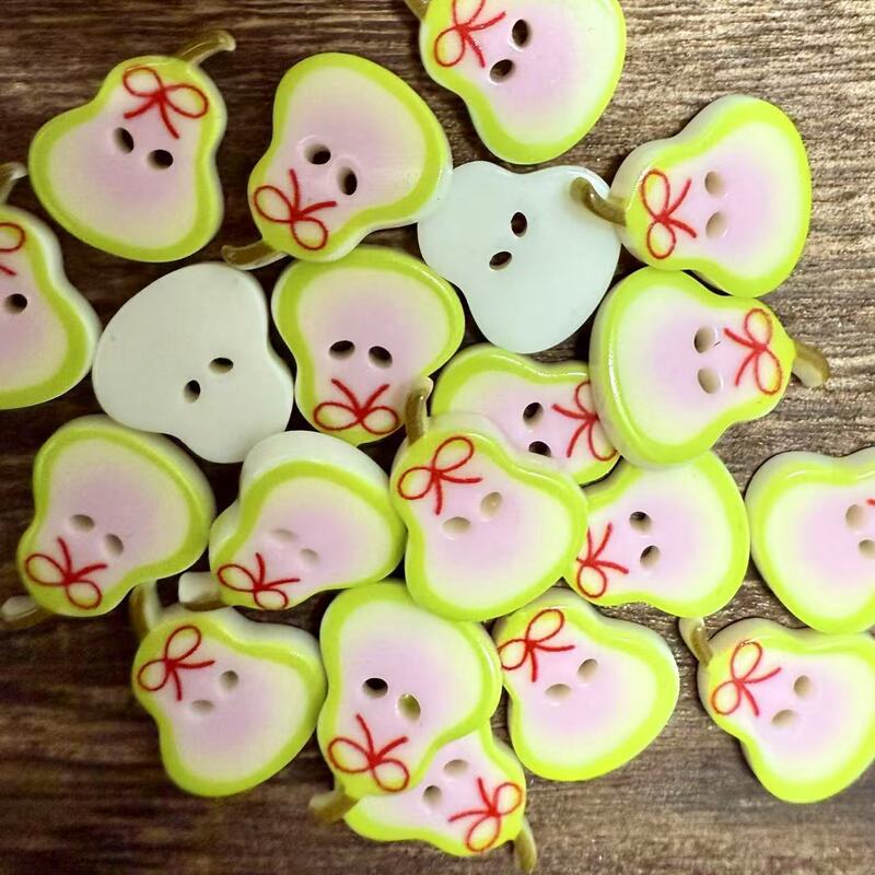 带蝴蝶结绿色小鸭梨毛衣开衫扣幼儿DIY装饰扣有版权请勿乱刷乱印|undefined