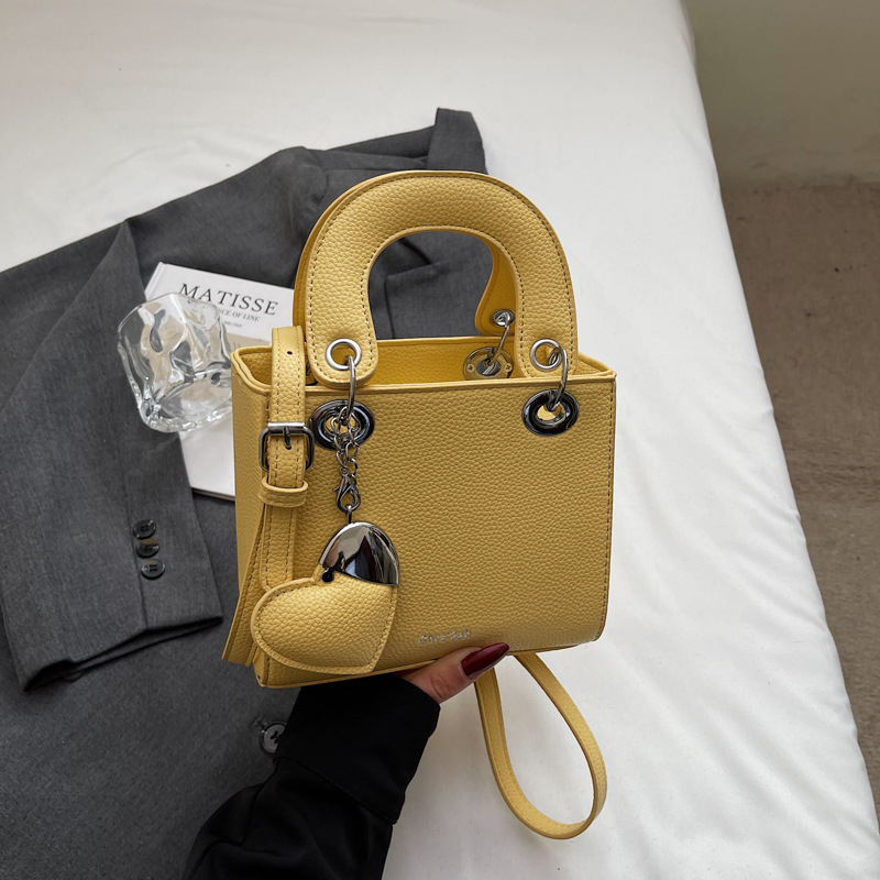 Bolso de mano de alta gama de comercio exterior para mujer 2025 nuevo bolso de hombro de todo fósforo de nicho de estilo occidental bolso de mensajero de moda