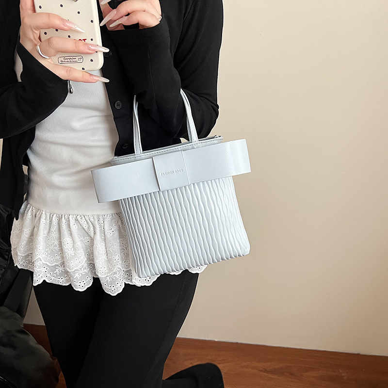 Bolso de moda coreano 2025 verano nuevo bolso femenino lazo princesa bandolera bolso bandolera corrugado fresco