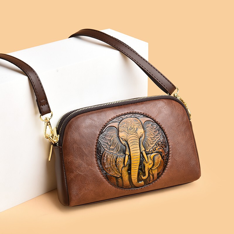 Handmade leather-carved embossed texture auspicious elephant crossbody bag, ethnic style casual commuter versatile bag for women, cross-border Handmade leather-carved embossed texture auspicious elephant crossbody bag, ethnic style casual commuter versatile bag for women, cross-border