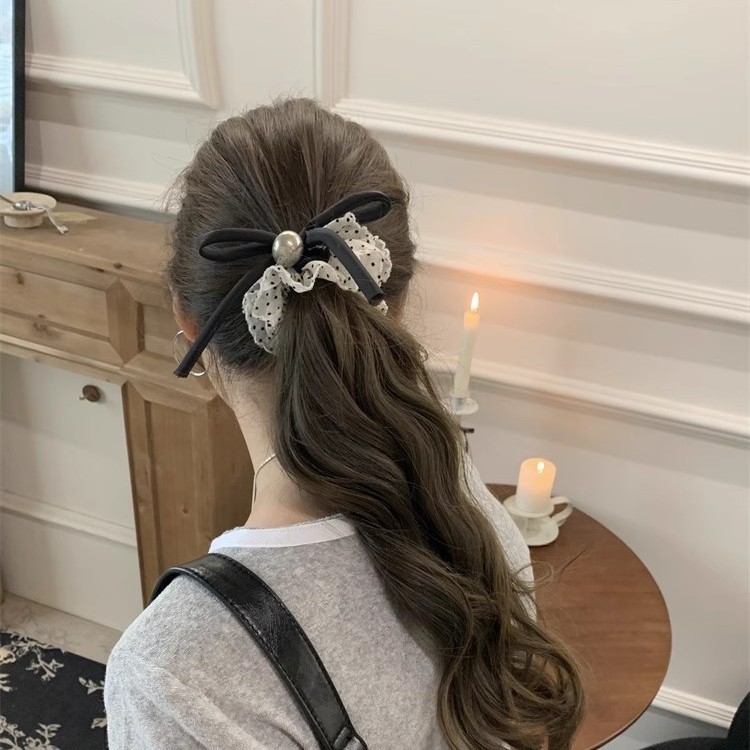 Douyin Explosite 2025 nuevo estilo de alta gama lazo de lazo lunares intestino grueso lazo para el cabello accesorios para el cabello de cuerda para la cabeza de mujer