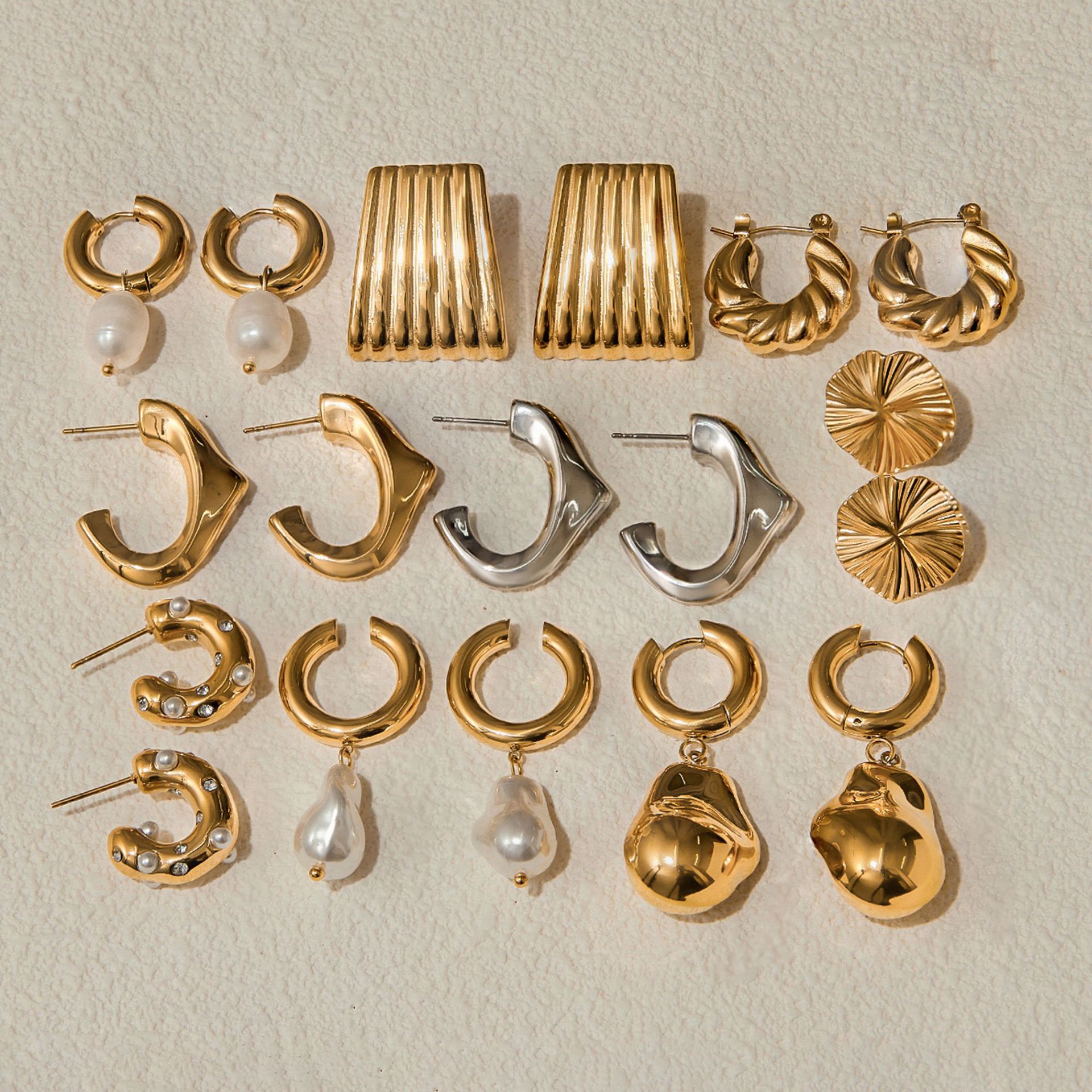 Jieding Pendientes de acero inoxidable europeos y americanos Pendientes de perlas de lujo ligero, sentido de diseño femenino, joyería de acero de titanio de nicho transfronterizo
