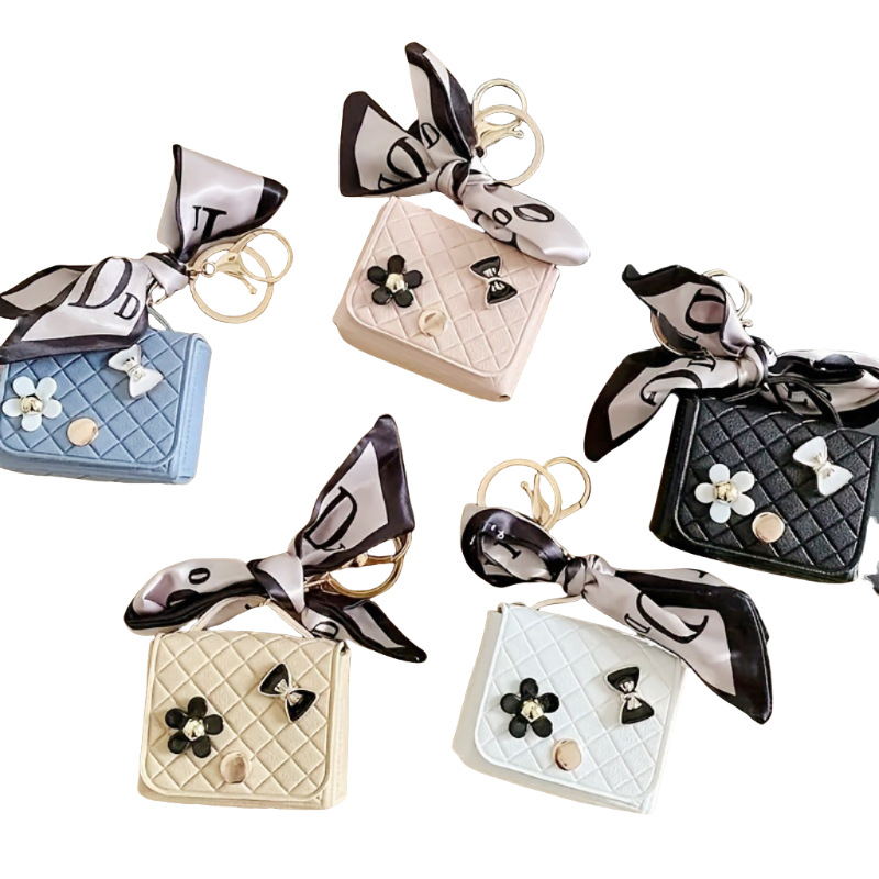 Nuevo estilo transfronterizo, moderno y exclusivo mini bolso acolchado tipo colgante, monedero para llaves, accesorio para auriculares.