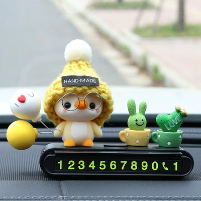 Nömrəli dayanma kartı – items for women - yellow-capped-penguin-black-parking-sign-green-plants
