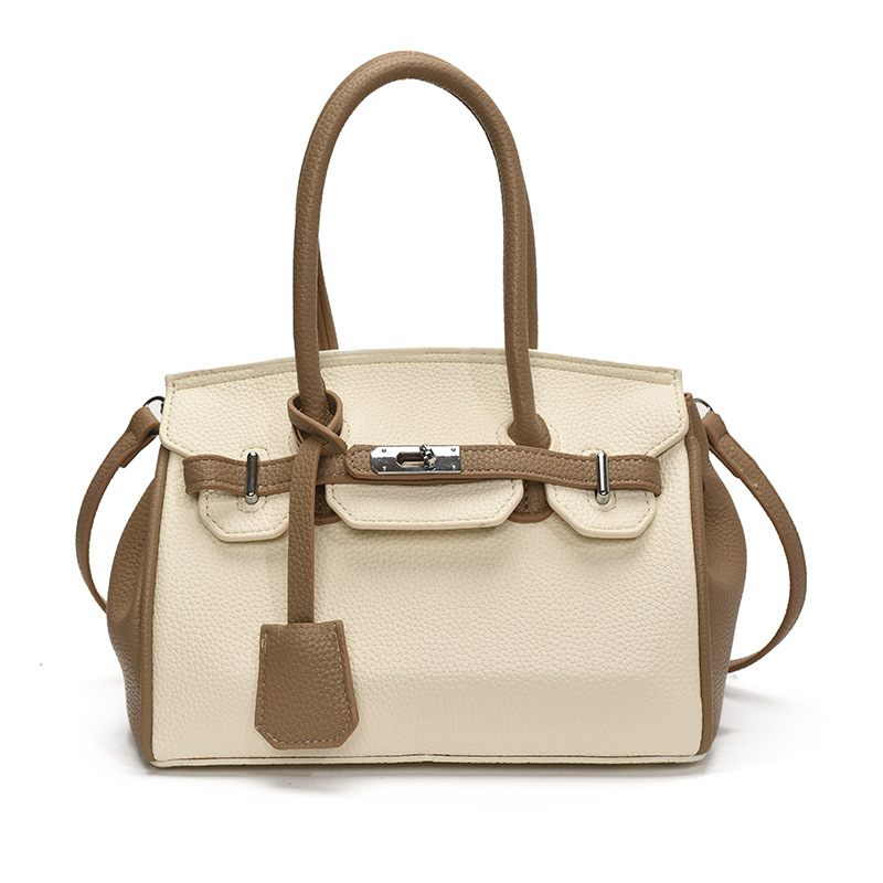 Bolso portátil de platino con textura de moda transfronteriza, bolso de hombro simple y versátil de lujo ligero, bolso de nicho de temperamento de gran capacidad