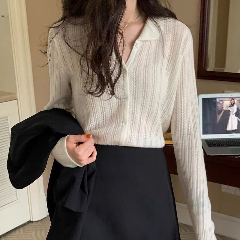 Doll collar hollow-out knitted sweater coat women's cardigan early Autumn 2023 new French slim chic top thin