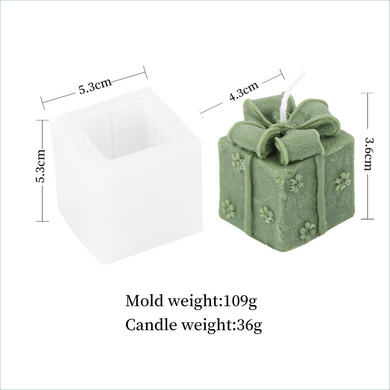 クリスマスの蝶結びのプレゼントの箱のろうそくの型diyの口の贈り物の箱のろうそくの型のシリカゲルのゴムの石膏は砂糖の型をひっくり返します。|undefined