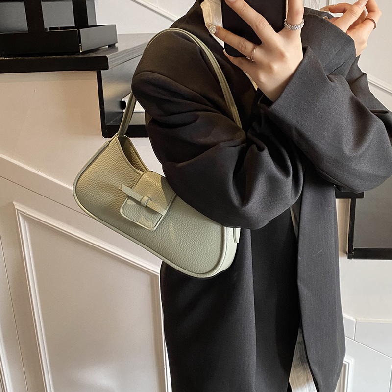 Versión coreana del bolso de axila de nicho 2025 primavera y verano nuevo bolso femenino lindo bolso de lazo bolso de hombro diario