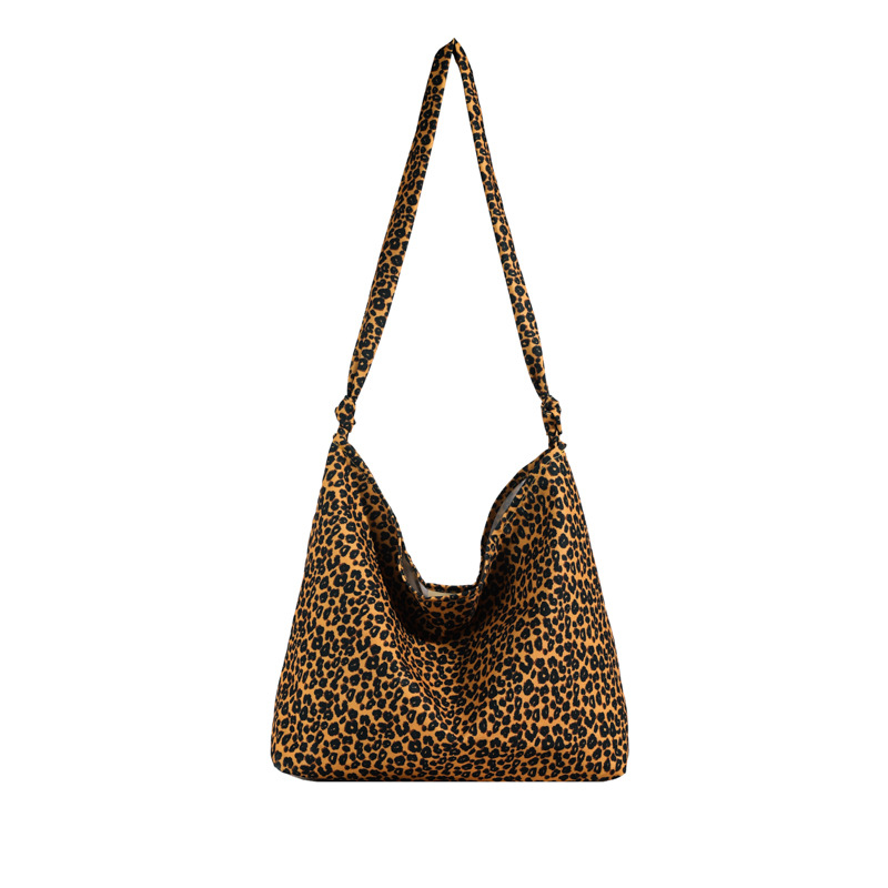 Estudiantes universitarios clase de viaje bolsa de gran capacidad para mujeres 2024 nueva moda extranjera leopardo tela mochila