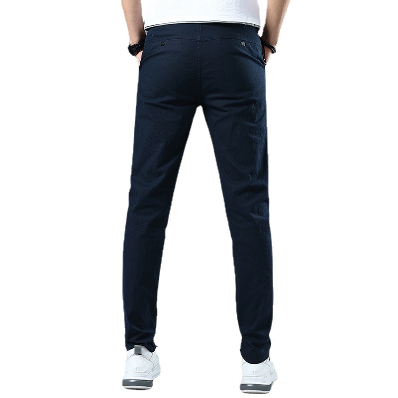 Four Seasons pantalones casuales elásticos para hombres al por mayor de los hombres jóvenes estilo coreano SLIM-Fit adelgazamiento simple moda lápiz pantalones hombres
