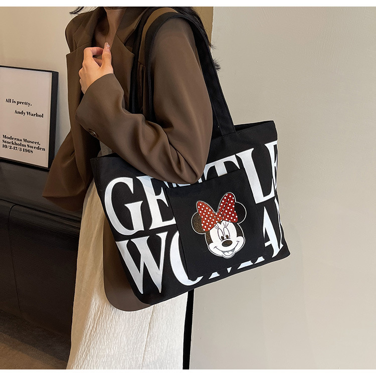2024 New canvas bag for women, single-shoulder, student, book, large-capacity hand-held bag with zipper, versatile for office workers' commuting undefined
