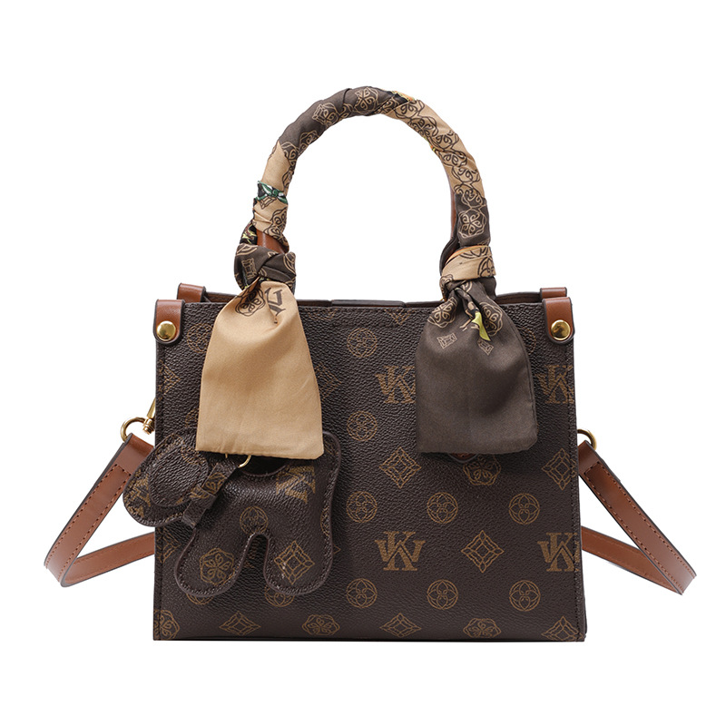 Bolso de impresión retro 2024 invierno nuevo bolso de tendencia temperamento de moda versátil hombro alto sentido ligero bolso de lujo de mujer