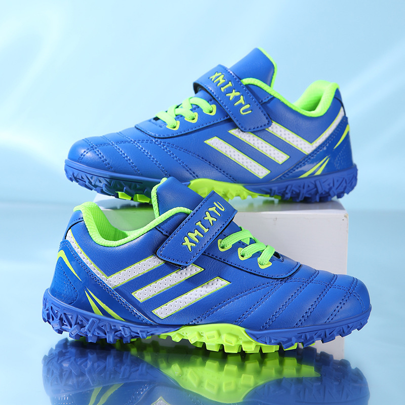 Foreign trade wholesale children's football shoes training shoes boys and girls primary and secondary school students kindergarten special broken nails TF nail shoes