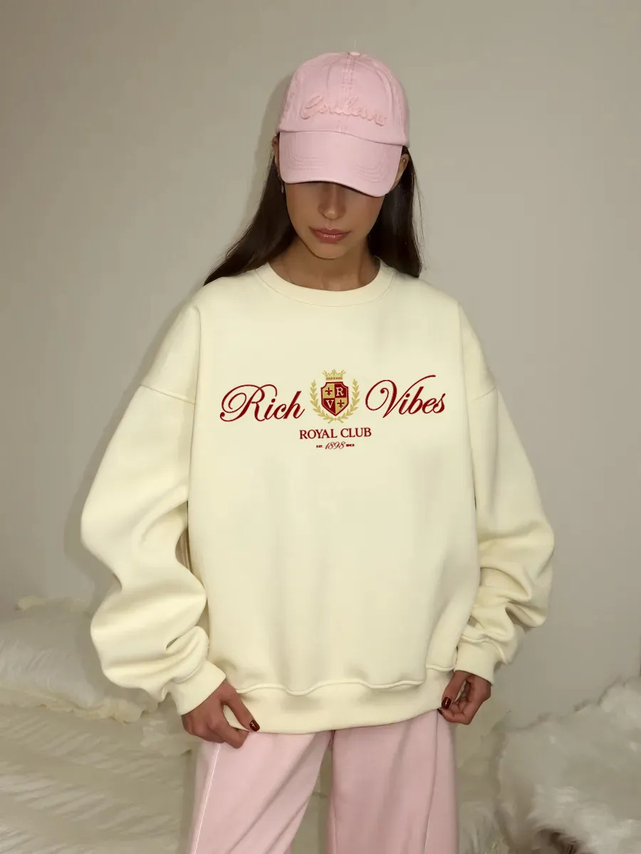 Demi-season elegant warm sweatshirt with a round collar