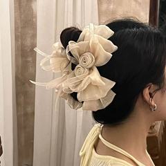 バラの大きいサイズの蝶結びのリボンは女性の新型のフレンチの髪を挟みます。