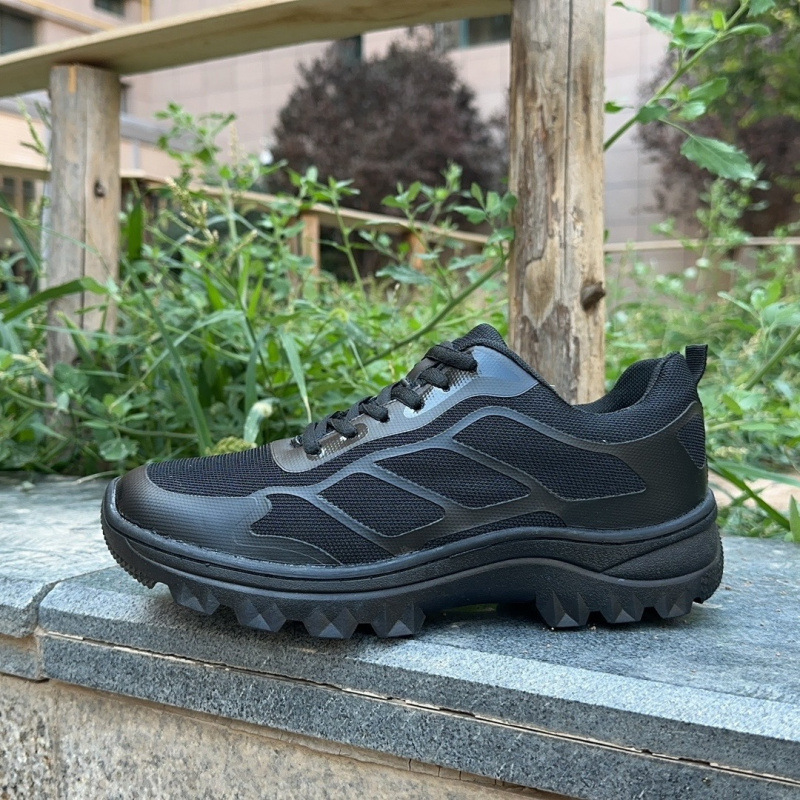 Primavera negra al aire libre ultra ligera de suela suave zapatos de corrida transpirables desodorantes zapatos de montaña zapatos de trabajo zapatos de hombre comercio exterior