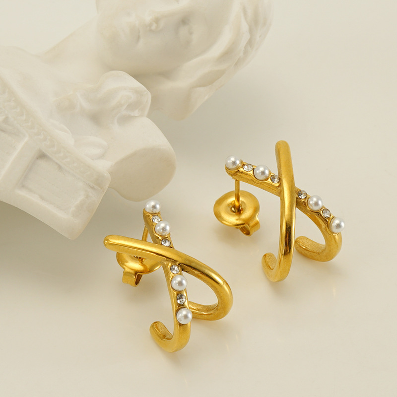 Cruzar la frontera europea y americana de acero de titanio X Cruz perla pendientes de alto grado pendientes de moda elegantes pendientes de acero inoxidable pendientes de las mujeres