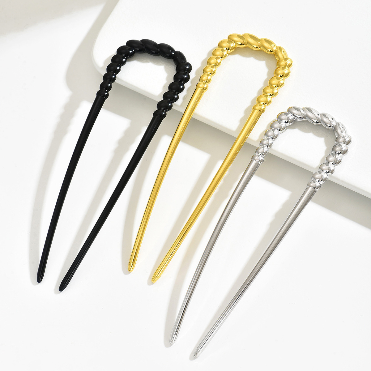 Europeos y estadounidenses simples cabello de disco U-pin de cabello dobles pinzas torcidas antiguo toque de cabeza de pelo de pelo lateral de cabeza de bola