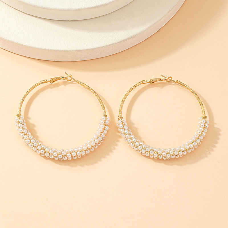 Bohemian Style Creative Round Small Pearl Bead Alloy Earrings display picture 6