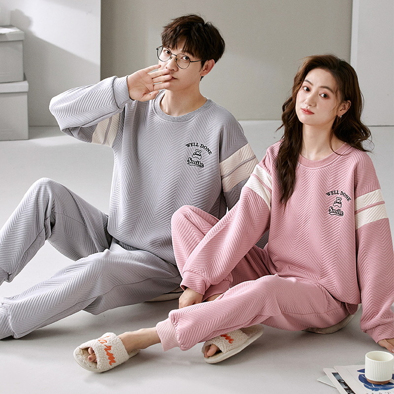 El otoño y el invierno sándwich de manga larga pareja pijamas engrosada de dibujos animados cuello redondo jersey de los hombres y las mujeres de ropa de casa caliente se puede usar fuera