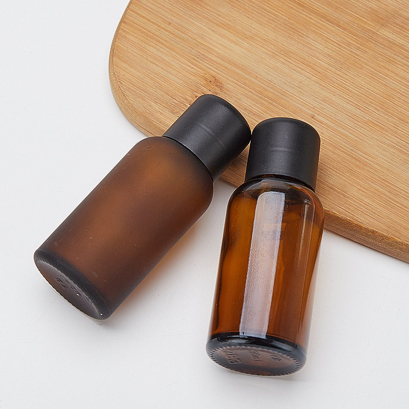 Spot 10ml botella de aceite de aceite de vidrio esmerilado marrón, tapa de cabeza antirrobo, botella de subembalaje cosmético, muestra de luz oscura, botella vacía