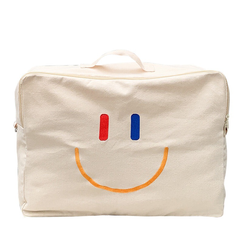 Bolsa Infantil Otoño/Invierno 2025, Nueva Bolsa con Cara Sonriente, Bolsa de Hombro de Lona de Gran Capacidad, Bolsa de Almacenamiento de Edredones Portátil para Jardín de Niños