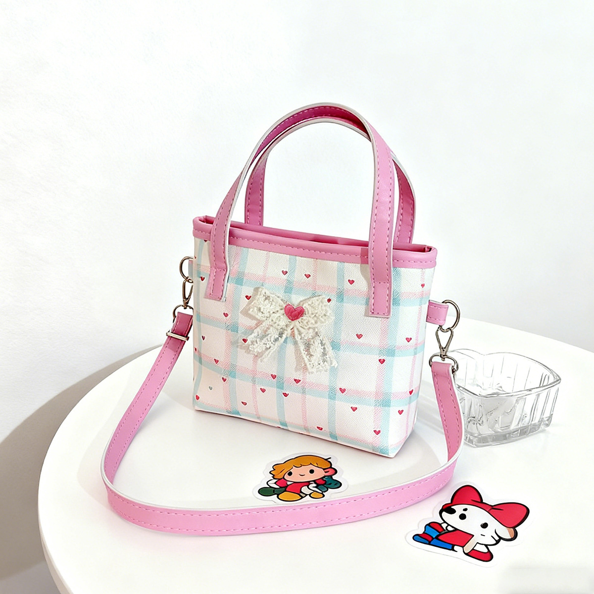 2026 nuevo bolso de niños lindos arcos de encaje bolsos de hombro para hombres y mujeres dulce bolso de mano para bebés