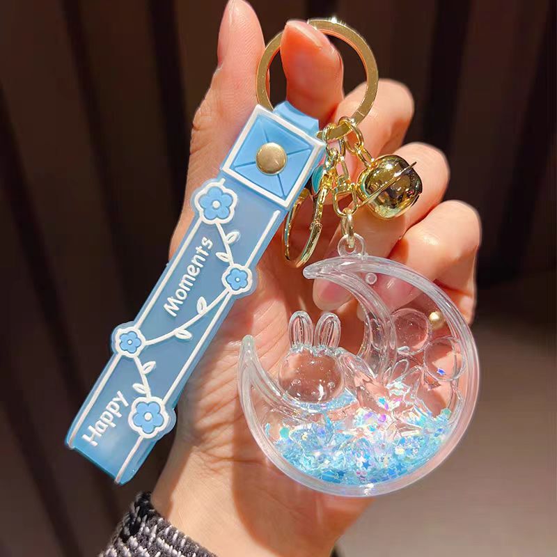 Net red quicksand bottle luminous peach pig quicksand bottle pendant ornaments into the oil keychain car bag accessories wholesale