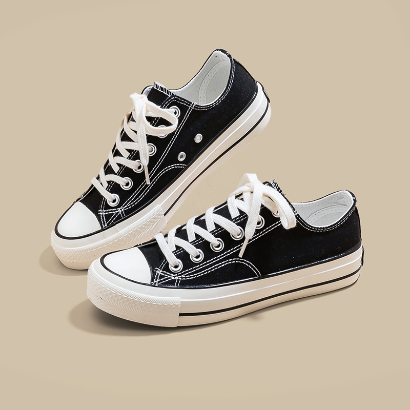 Zapatos de lona de tacón plano de mujer explosión baja estilo de moda coreano versátil estilo clásico retro nicho diseño zapatos de lona blancos image 6