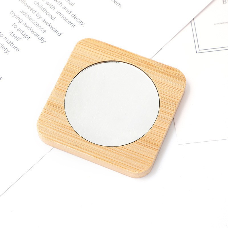 Fábrica de bambú al por mayor pequeño espejo circular de madera espejo mini espejo de maquillaje para dibujar logotipo de etiquetado personalizado