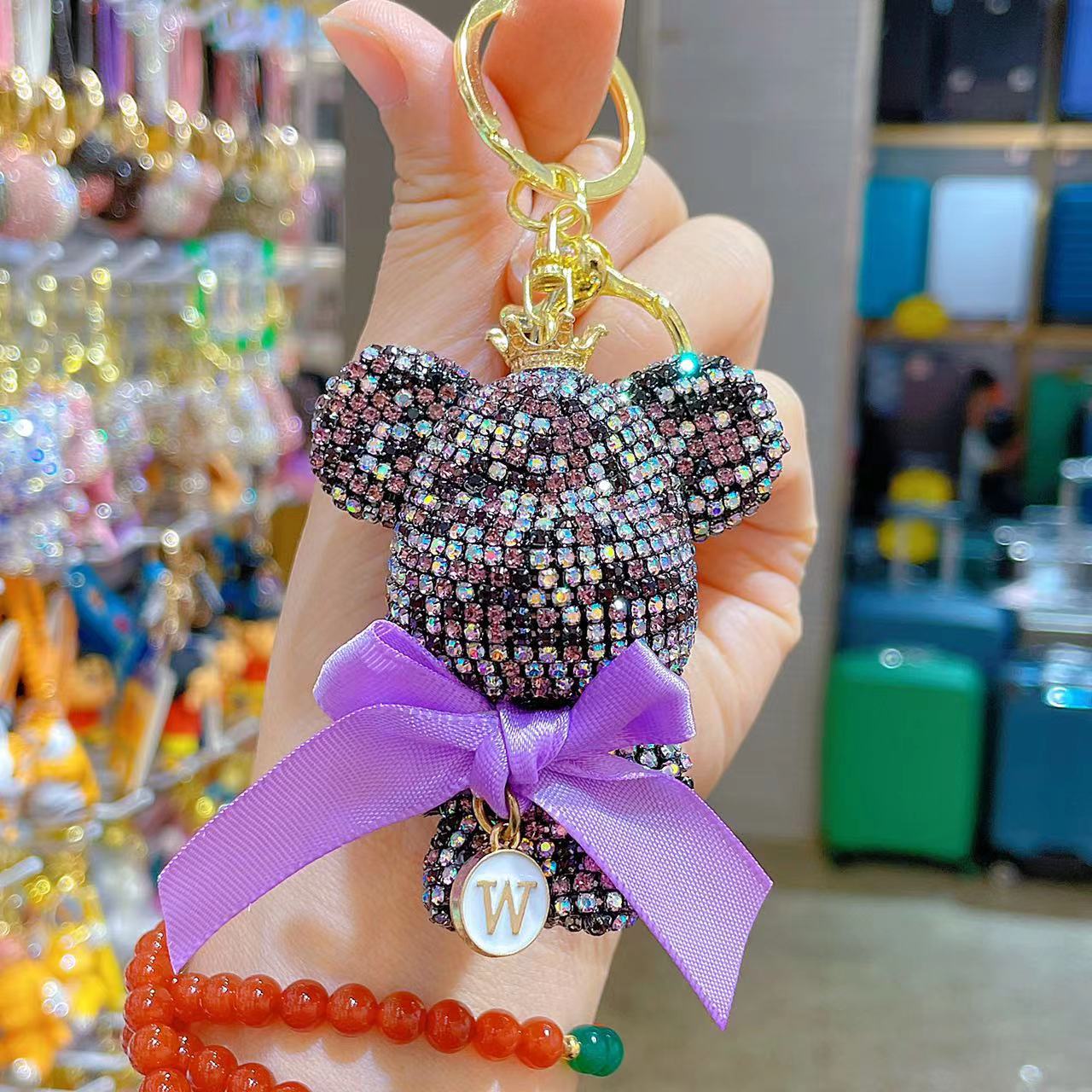 Venta directa de fábrica de lujo completo diamante muñeca llavero pajarita cabeza grande oso completo diamante bolsa colgante coche llavero