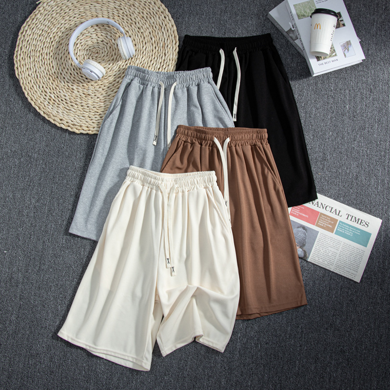 Primavera, verano y otoño nuevos pantalones de gofres de cinco puntos para hombres y mujeres con el mismo estilo pantalones casuales rectos pantalones simples de color sólido