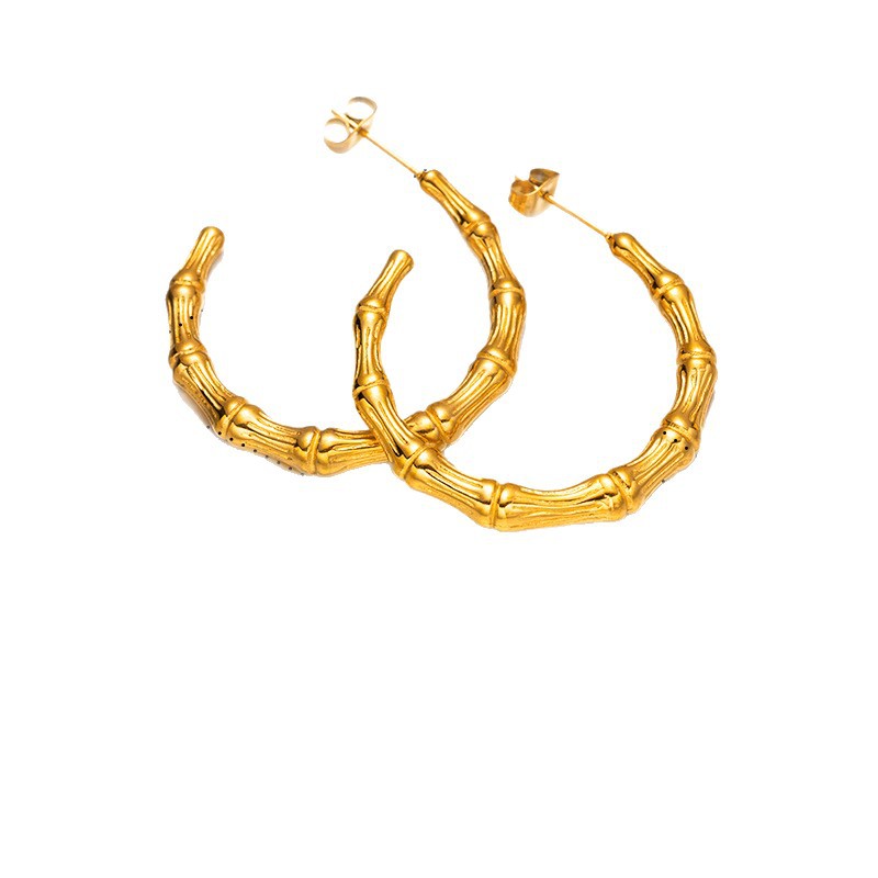 TENA Europa y los Estados Unidos transfronterizos aretes de acero inoxidable lujo ligero de alto nivel sensación de bambú letras en forma de C exagerado aretes HOOP para mujeres
