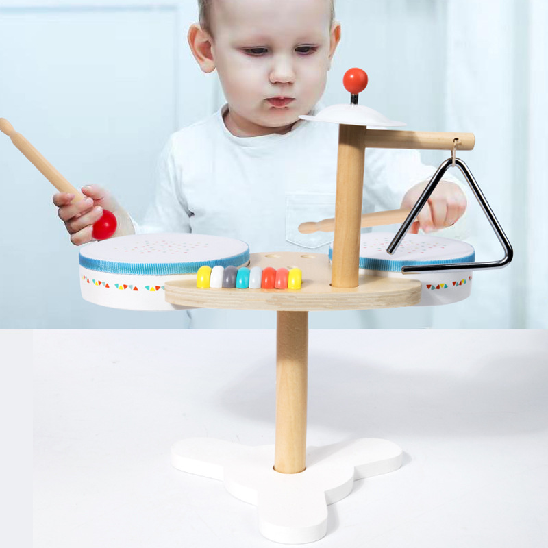 El tambor multifuncional de educación temprana de madera Montessori para niños cultiva el talento musical del bebé