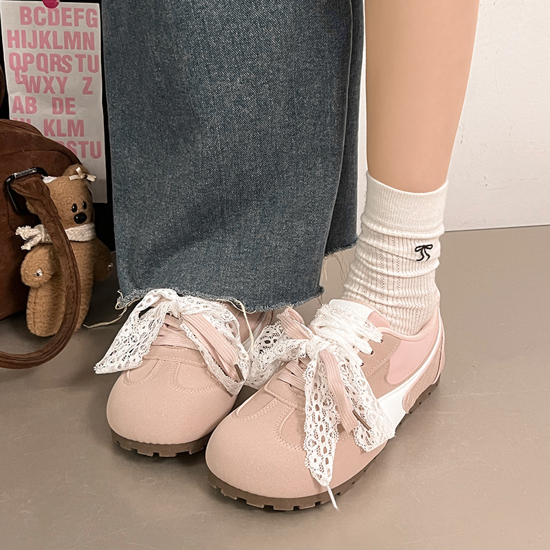 Zapatillas de deporte rosa para mujer 2025 nuevas carreras de primavera y otoño casual todo-fósforo encaje nicho zapatos de entrenamiento de ballet de suela fina de fondo plano