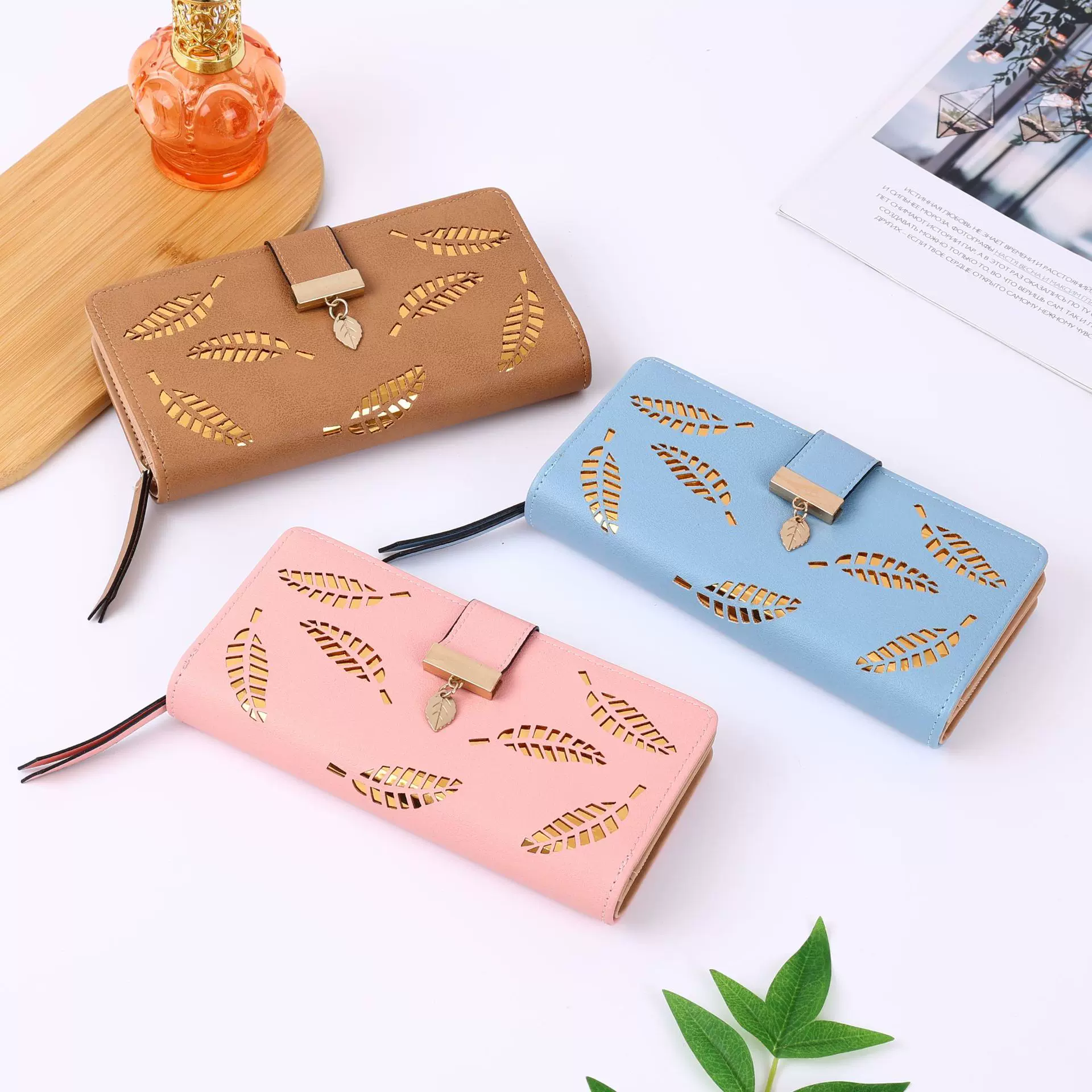 镂空新款韩版女士钱包长款时尚手拿包镂空树叶拉链搭扣钱包女包包