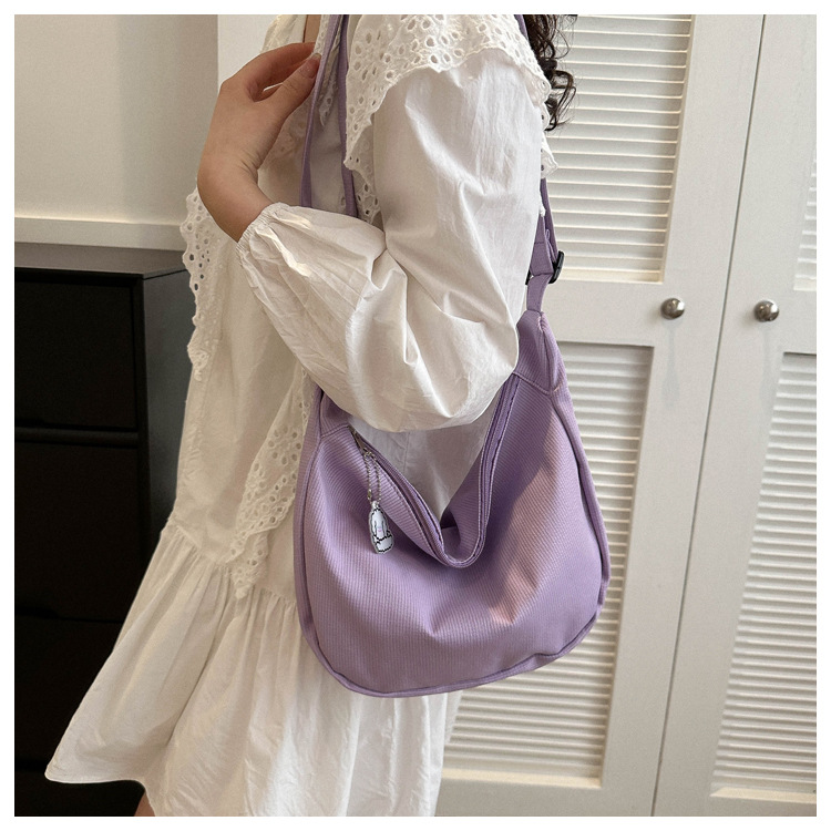 Large capacity canvas shoulder for women in spring summer 2023, new solid color, simple and fashionable casual bag,_voghion.com