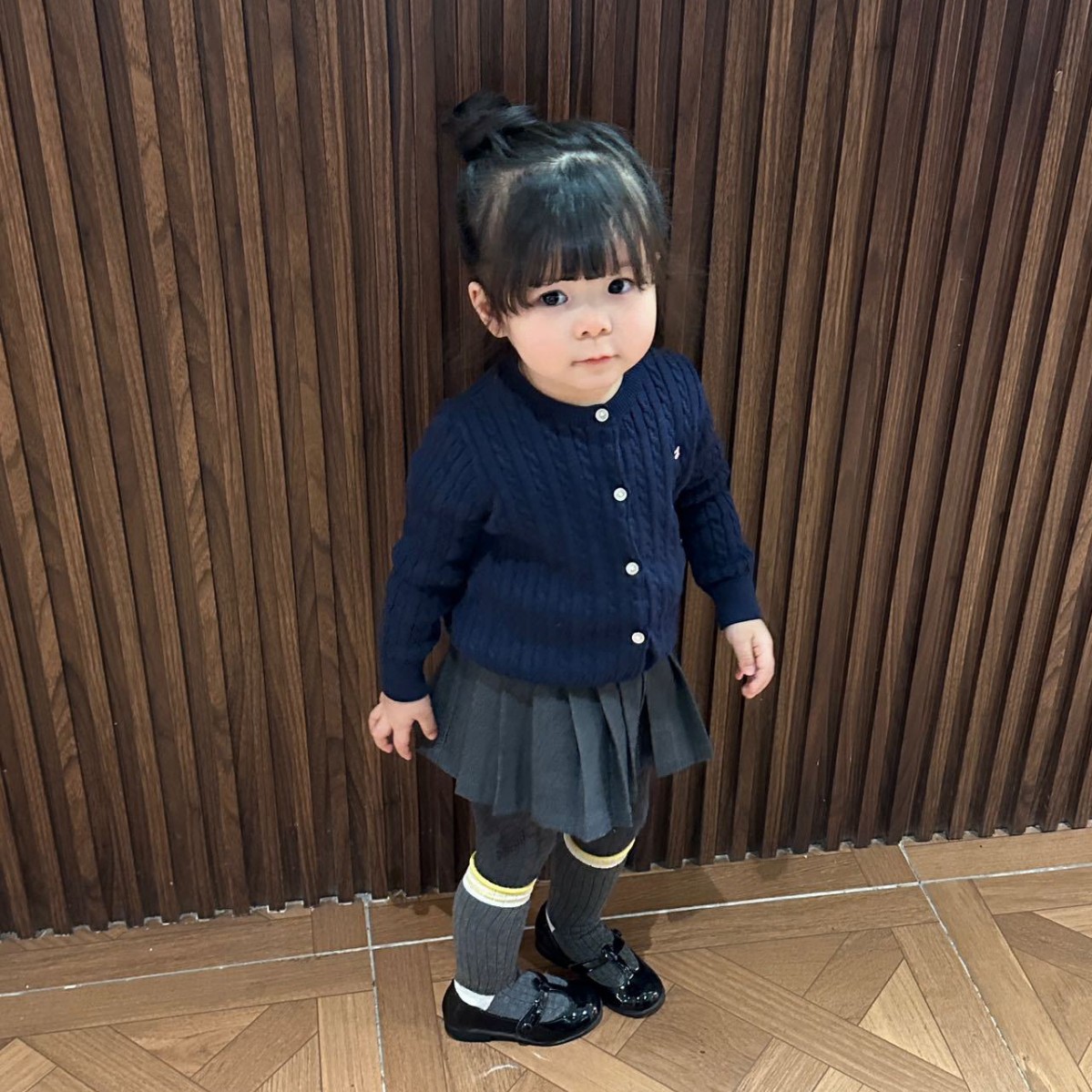 Curled yellow striped children's socks in kindergarten to go to…