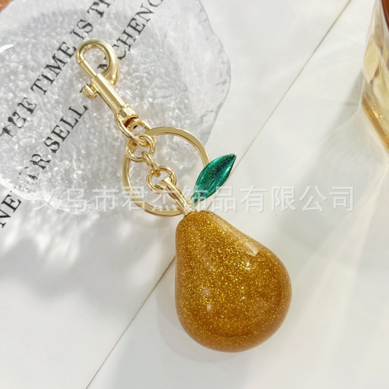 さくらんぼのキーホルダーアクセサリーのバッグのストラップがおしゃれで美しい水晶樹脂車センチ車のキーホルダーの女性