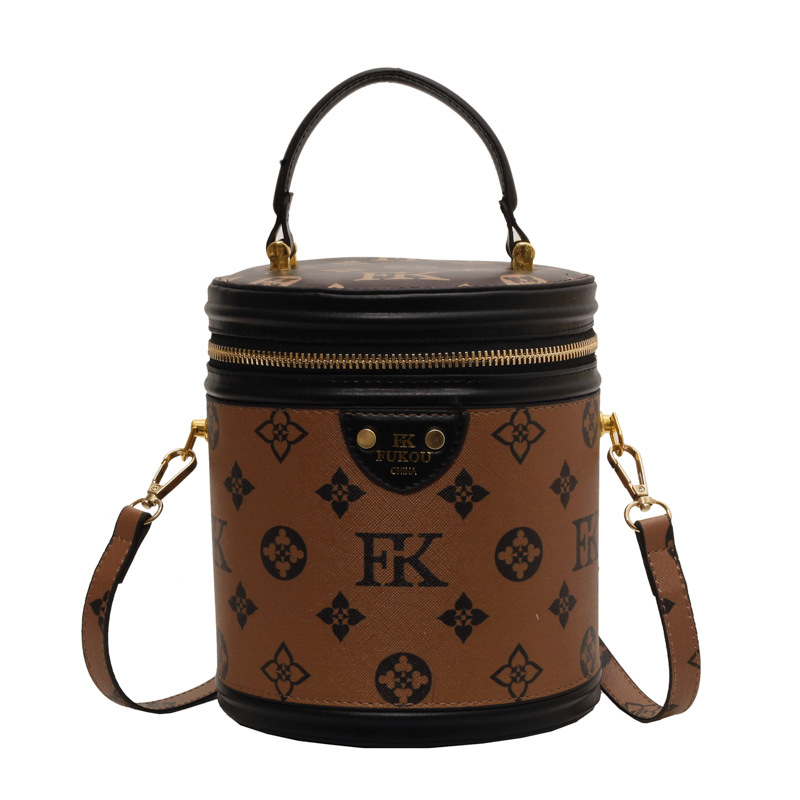 Bolsas de moda de mujeres retro retro bolsas de barril 2024 nuevas letras impresas de gran capacidad bolsas de barril de transporte