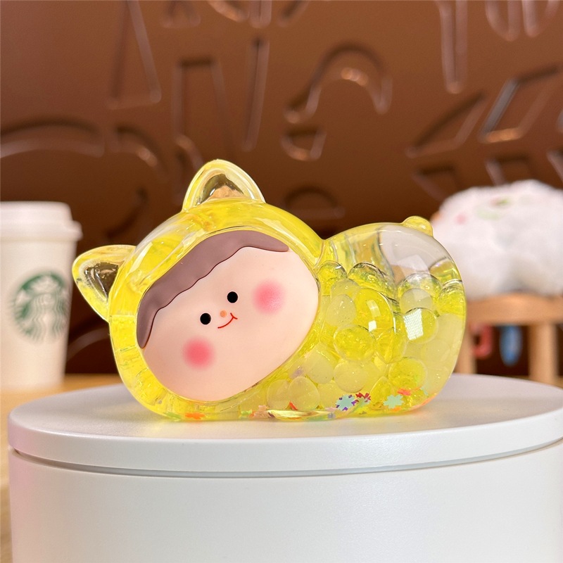 Nocturno explosivo gato macarón super lindo dibujos animados arena flotante en aceite caja ciega pequeña bolsa ciega adornos al por mayor
