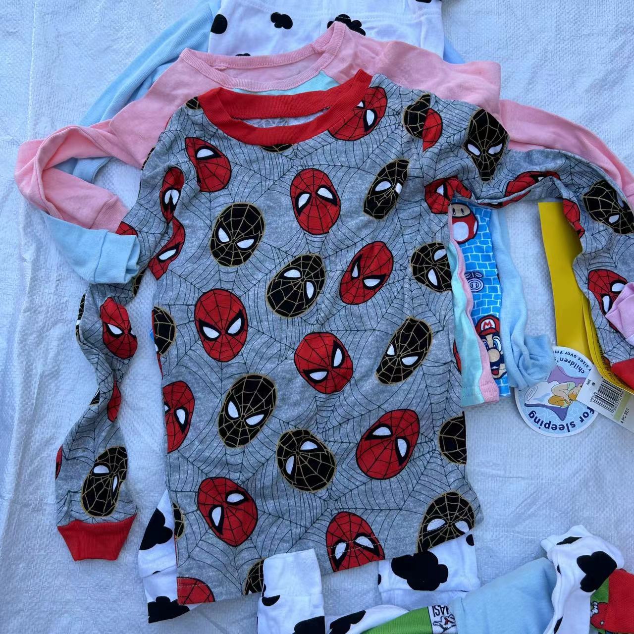 Ropa para niños 23 nuevos niños y niñas pantalones de manga larga ropa de otoño pantalones largos pantalones superiores de algodón de dibujos animados para niños venta de una sola pieza