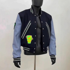 アメリカのレトロな青い皮の袖は野球の服をつなぎ合わせます。