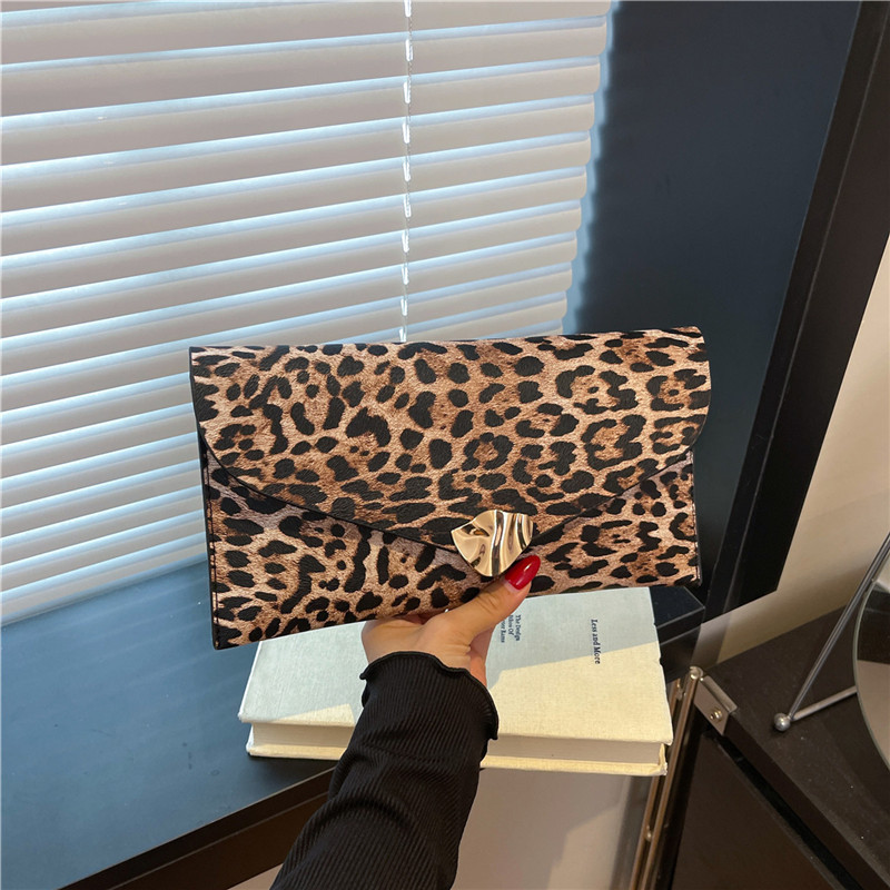 Leopardo de moda europea y americana bolsa de cena casual personalidad femenina alta sensación de temperamento extranjero bolsa de mano universal