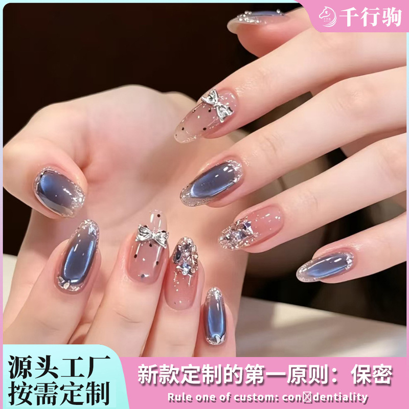 Custom-made, cool and gentle, smoky blue cat-eye, silver butterfly-knot, sparkling rhinestone, almond-shaped, 24-piece, detachable press-on nails Custom-made, cool and gentle, smoky blue cat-eye, silver butterfly-knot, sparkling rhinestone, almond-shaped, 24-piece, detachable press-on nails