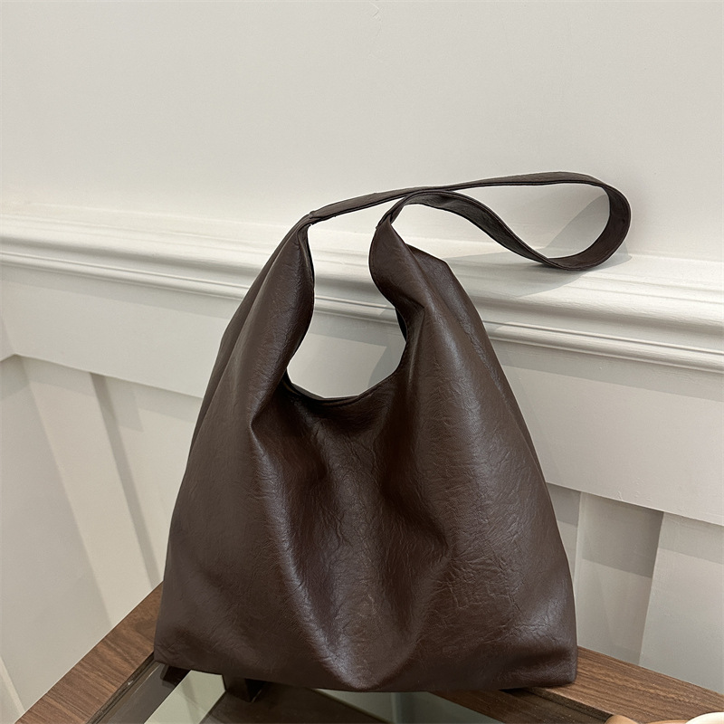 Textura de piel de aceite de gran capacidad perezosa de viento suave de color sólido retro invierno ocio viaje de la axila bolso de hombro