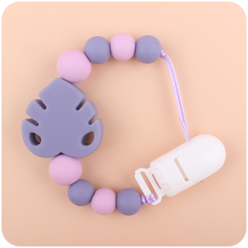 Suministros para bebés chupete cadena creativa bebé dibujos animados hojas silicona mordedura cadena anti-gota molar Nuevo