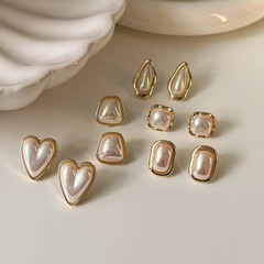 Korean Pure Silver Needle Heart Pearl Earrings for Women, Unique Design, Sweet and Elegant Style, High-Quality Accessory, Perfect for Various Outfits